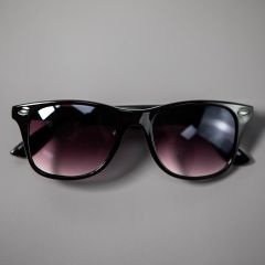 black sunglasses with darkened lenses