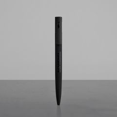 Ballpoint pen in matte black with shiny “SCHIEBEL” lettering on the barrel and a small drone on the clip